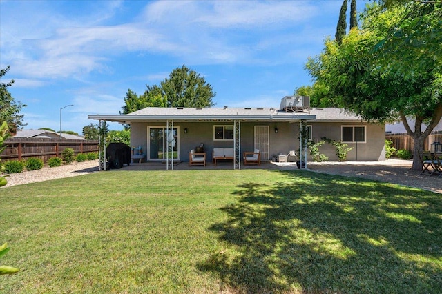 1448 Ashcroft Ave, Clovis, CA 93611 - back of house with a patio and an outdoor living space
