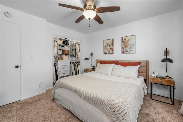 1448 Ashcroft Ave, Clovis, CA 93611 - bedroom with light carpet, a closet, and a ceiling fan