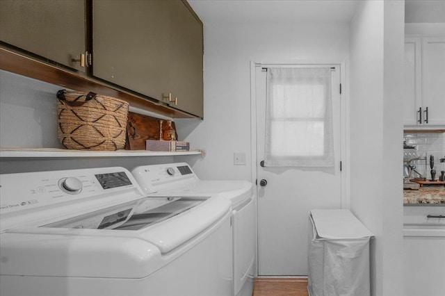 1448 Ashcroft Ave, Clovis, CA 93611 - washroom featuring washing machine and clothes dryer and cabinet space