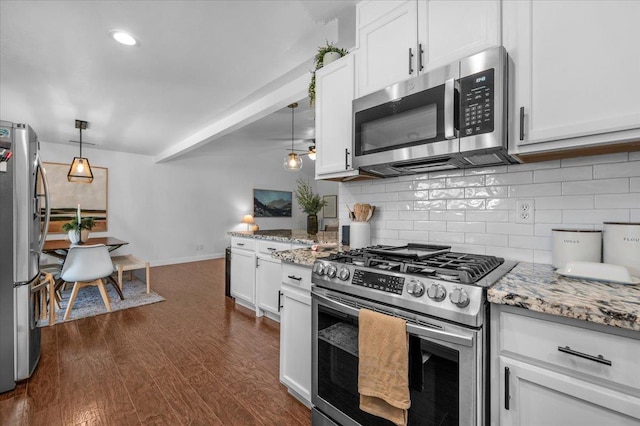 1448 Ashcroft Ave, Clovis, CA 93611 - kitchen featuring appliances with stainless steel finishes, white cabinetry, tasteful backsplash, dark wood-style flooring, and recessed lighting