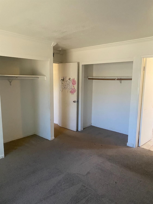 2673 N Marty Ave, Fresno, CA 93722 - unfurnished bedroom featuring crown molding and carpet floors