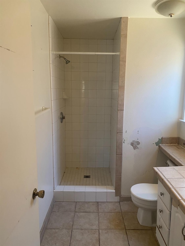 2673 N Marty Ave, Fresno, CA 93722 - bathroom with vanity, a stall shower, and tile patterned floors