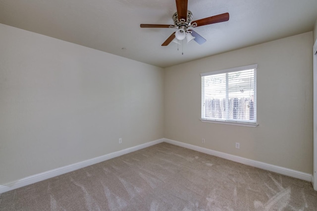 1437 N San Pablo Ave, Fresno, CA 93728 - empty room with carpet floors and a ceiling fan