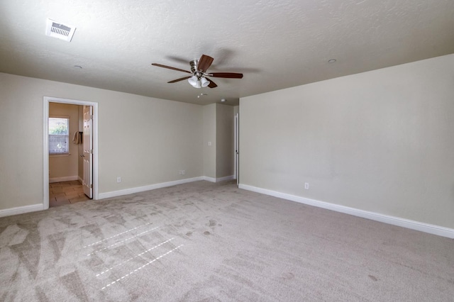 1437 N San Pablo Ave, Fresno, CA 93728 - empty room with carpet, a ceiling fan, and a textured ceiling