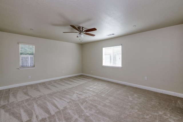 1437 N San Pablo Ave, Fresno, CA 93728 - unfurnished room with light colored carpet and a ceiling fan