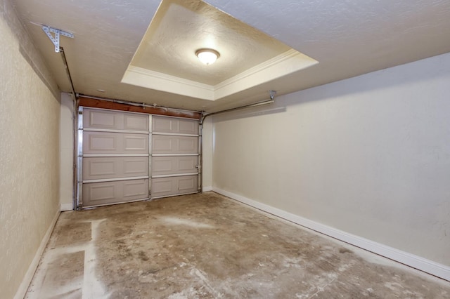 1437 N San Pablo Ave, Fresno, CA 93728 - garage with baseboards and a textured wall