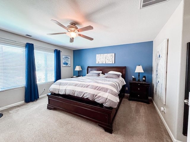 2457 Carson Ave, Clovis, CA 93611 - carpeted bedroom with a ceiling fan and a textured ceiling