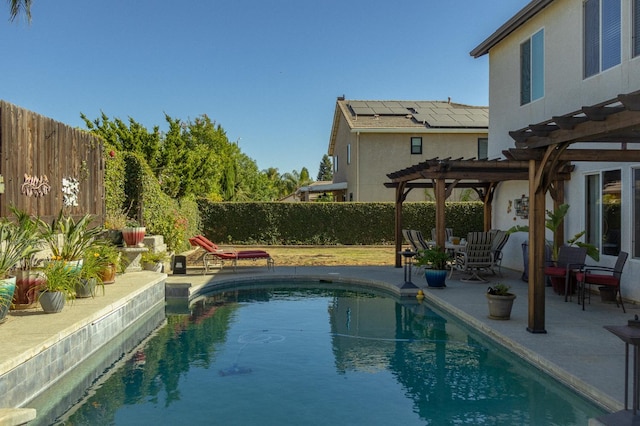 2457 Carson Ave, Clovis, CA 93611 - view of swimming pool with a pergola, a fenced backyard, and a patio