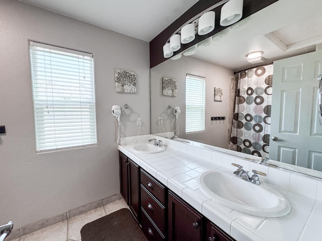2457 Carson Ave, Clovis, CA 93611 - bathroom with double vanity and tile patterned flooring