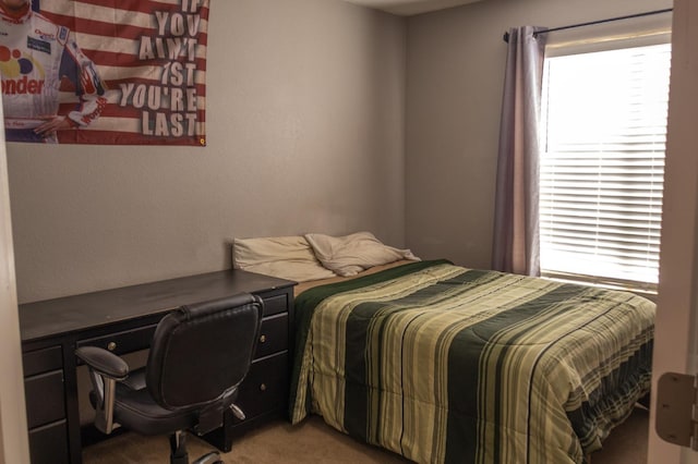 2457 Carson Ave, Clovis, CA 93611 - carpeted bedroom featuring multiple windows and an office area