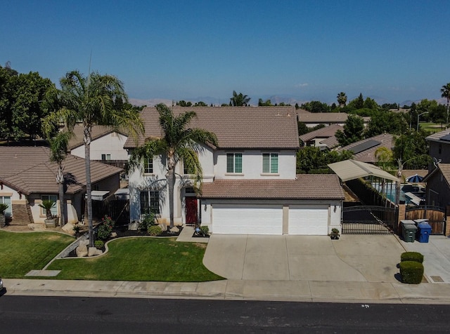 2457 Carson Ave, Clovis, CA 93611 - traditional-style home featuring a tiled roof, stucco siding, a garage, and concrete driveway