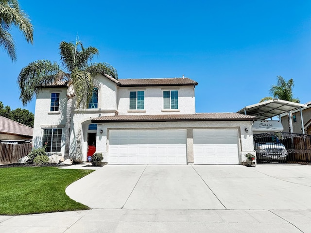 2457 Carson Ave, Clovis, CA 93611 - view of front of home with stucco siding, concrete driveway, a tile roof, and a garage