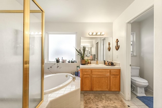 3787 Via Capitola, Madera, CA 93637 - bathroom with vanity, a bath, tile patterned flooring, and a stall shower