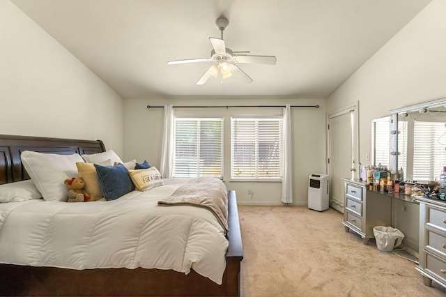 3787 Via Capitola, Madera, CA 93637 - bedroom featuring multiple windows, light carpet, vaulted ceiling, and a ceiling fan