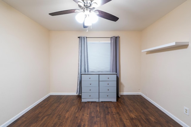 4115 E Montecito Ave, Fresno, CA 93702 - unfurnished bedroom with dark wood-type flooring and a ceiling fan