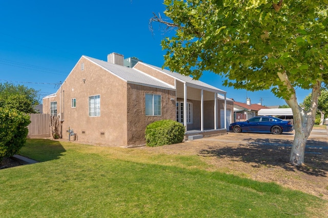 4115 E Montecito Ave, Fresno, CA 93702 - view of side of home with stucco siding and crawl space