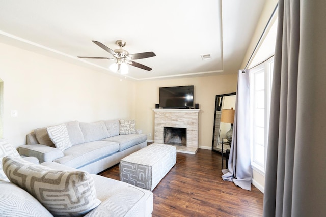 4115 E Montecito Ave, Fresno, CA 93702 - living room with ceiling fan, a high end fireplace, and dark wood-style floors