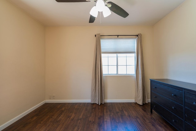 4115 E Montecito Ave, Fresno, CA 93702 - unfurnished room with dark wood-style flooring and ceiling fan