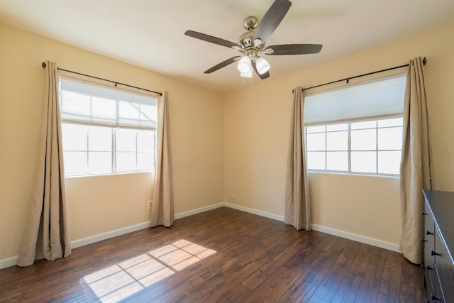 4115 E Montecito Ave, Fresno, CA 93702 - empty room with dark wood-style flooring, plenty of natural light, and a ceiling fan