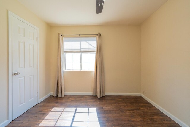 4115 E Montecito Ave, Fresno, CA 93702 - unfurnished room featuring dark wood-style flooring and ceiling fan