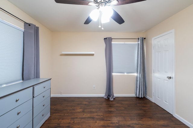 4115 E Montecito Ave, Fresno, CA 93702 - unfurnished bedroom with dark wood-type flooring and a ceiling fan