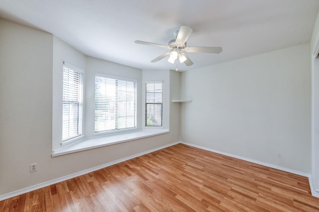 689 E Pintail Cir, Fresno, CA 93730 - empty room with light wood finished floors and ceiling fan