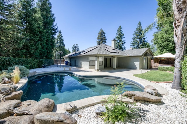 689 E Pintail Cir, Fresno, CA 93730 - view of swimming pool with a patio