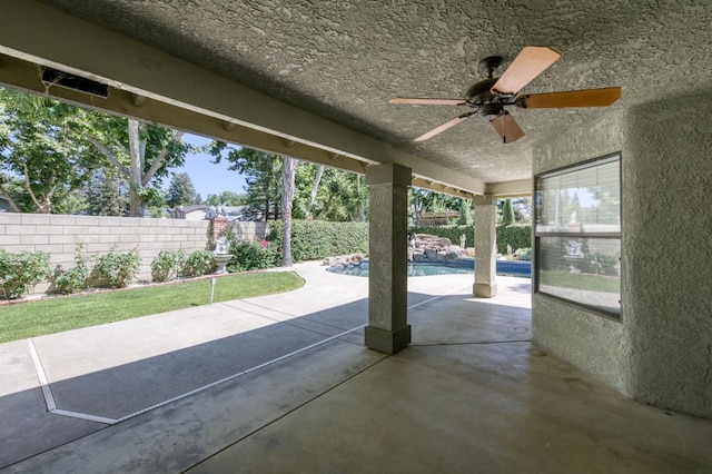 689 E Pintail Cir, Fresno, CA 93730 - fenced backyard with ceiling fan and a patio area