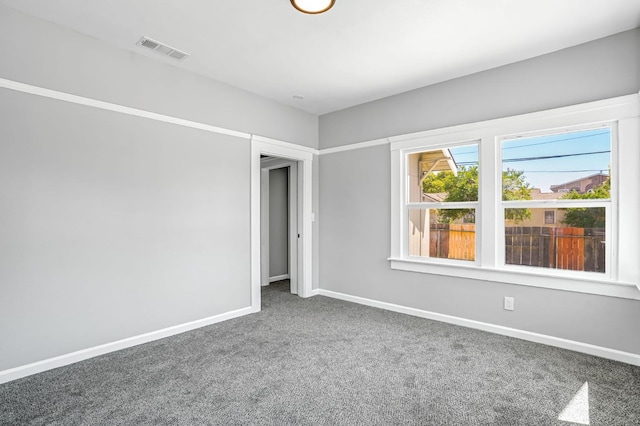 1303 N Calaveras St, Fresno, CA 93728 - unfurnished room featuring carpet flooring and baseboards