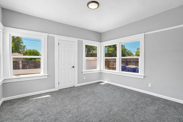 1303 N Calaveras St, Fresno, CA 93728 - carpeted empty room with baseboards