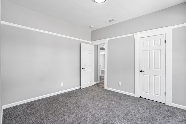 1303 N Calaveras St, Fresno, CA 93728 - unfurnished bedroom featuring carpet floors and baseboards