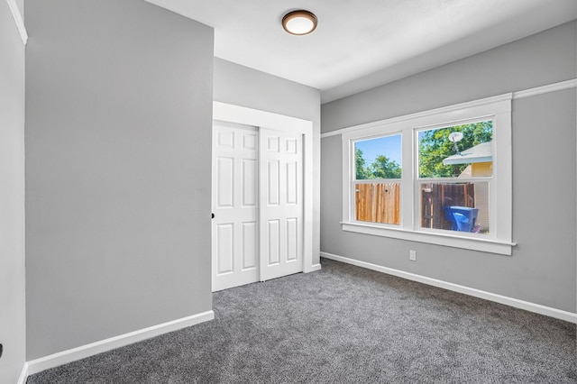 1303 N Calaveras St, Fresno, CA 93728 - unfurnished bedroom with carpet floors and a closet