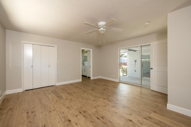 4342 E Buckingham Way, Fresno, CA 93726 - unfurnished bedroom with light wood finished floors, access to exterior, a ceiling fan, and connected bathroom