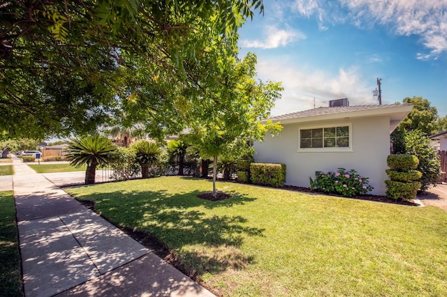 4342 E Buckingham Way, Fresno, CA 93726 - view of front of house featuring stucco siding and a front yard