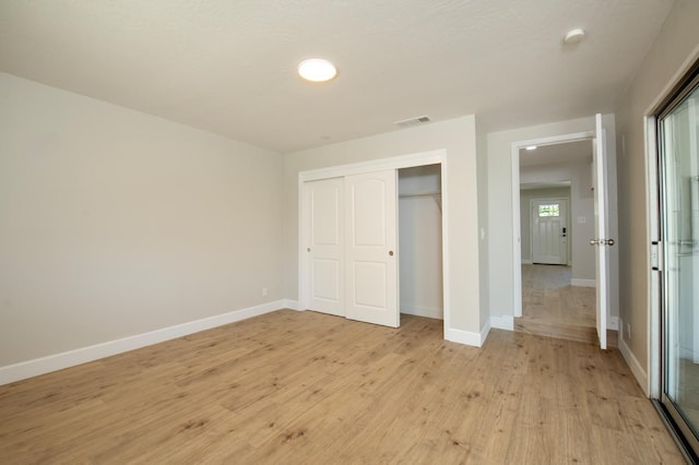 4342 E Buckingham Way, Fresno, CA 93726 - unfurnished bedroom with light wood-type flooring and a closet