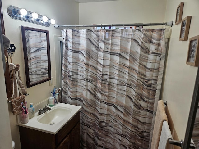 432 Brimmer Rd, Merced, CA 95341 - bathroom featuring vanity and curtained shower