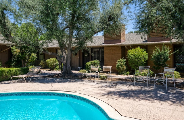 5072 N Wishon Ave Unit C, Fresno, CA 93704 - swimming pool with a patio