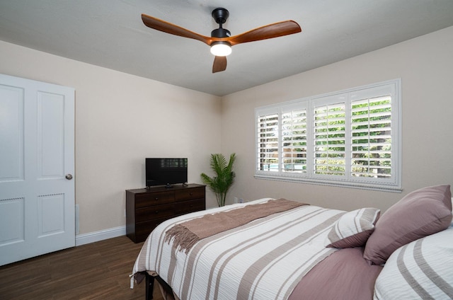 5072 N Wishon Ave Unit C, Fresno, CA 93704 - bedroom with dark wood-style flooring and a ceiling fan