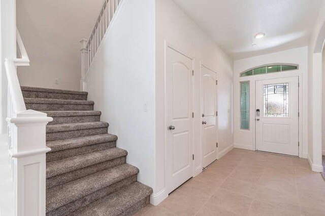 2166 Junipero Ave, Clovis, CA 93619 - entrance foyer with stairs and light tile patterned floors