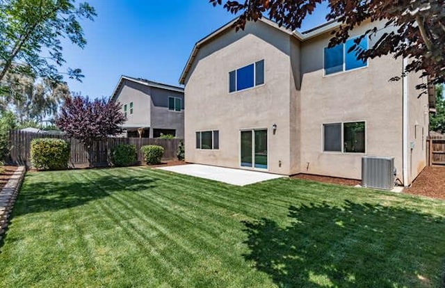 2166 Junipero Ave, Clovis, CA 93619 - rear view of house with stucco siding, a patio, and a fenced backyard