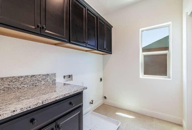 2166 Junipero Ave, Clovis, CA 93619 - laundry area featuring electric dryer hookup, cabinet space, and washer hookup