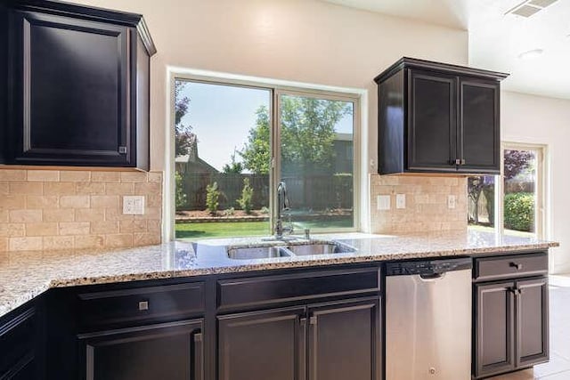 2166 Junipero Ave, Clovis, CA 93619 - kitchen featuring dishwasher, light stone countertops, and healthy amount of natural light
