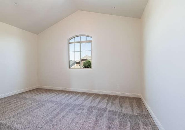 2166 Junipero Ave, Clovis, CA 93619 - empty room with carpet floors and vaulted ceiling