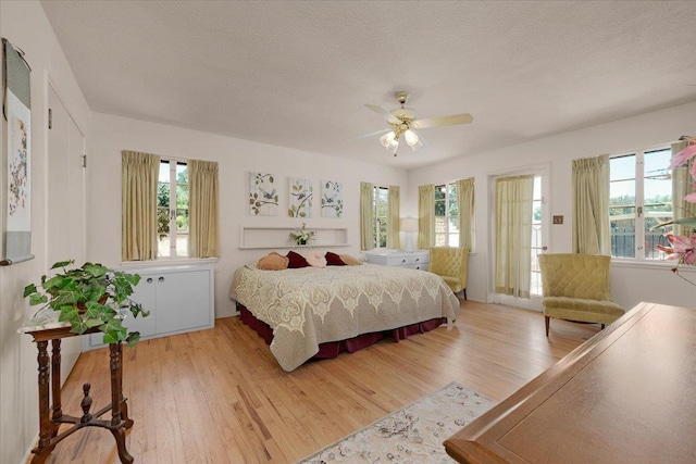 5481 E Geary St, Fresno, CA 93727 - bedroom with light wood-type flooring, a ceiling fan, and a textured ceiling