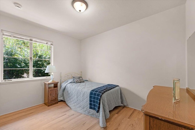 5481 E Geary St, Fresno, CA 93727 - bedroom with light wood-style floors