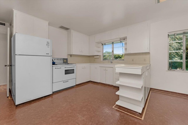 5481 E Geary St, Fresno, CA 93727 - kitchen with white appliances, open shelves, white cabinetry, and plenty of natural light