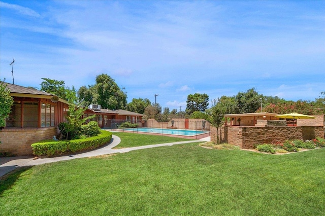 5481 E Geary St, Fresno, CA 93727 - view of yard featuring an outdoor pool