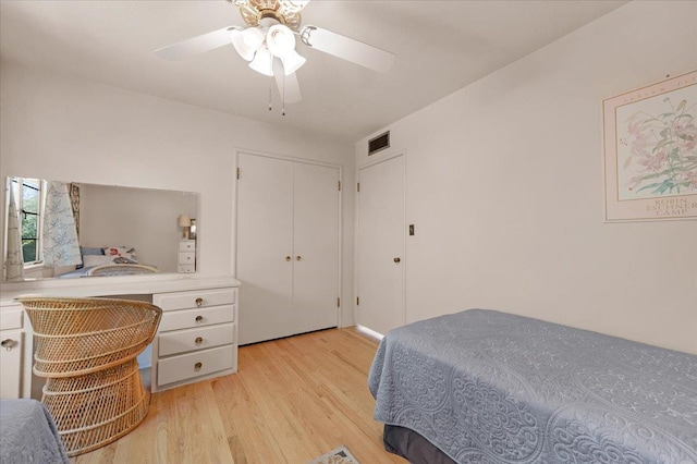 5481 E Geary St, Fresno, CA 93727 - bedroom with light wood-type flooring and ceiling fan