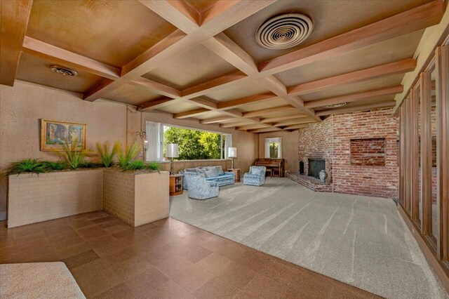 5481 E Geary St, Fresno, CA 93727 - living room with beam ceiling, tile patterned floors, coffered ceiling, and a fireplace
