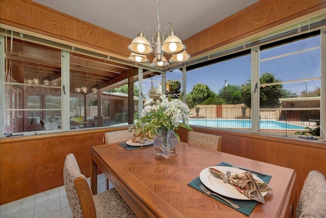 5481 E Geary St, Fresno, CA 93727 - sunroom featuring a chandelier